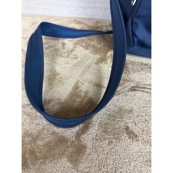 Travel on antitheft classic Crossbody bucket bag navy blue new without tags 
￼ - Picture 3 of 10